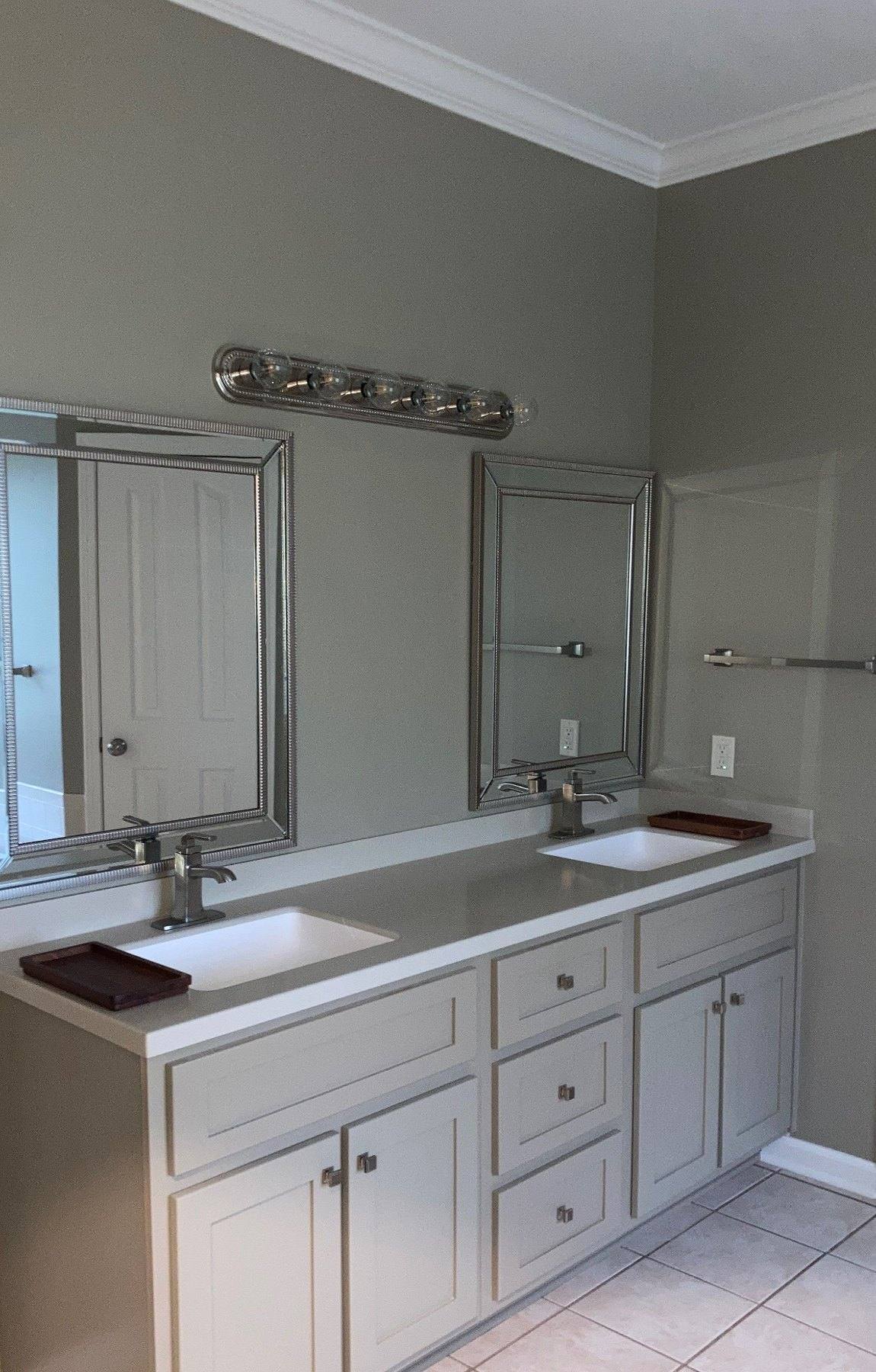 Custom bathroom double vanity and mirror update by Crain Bros Inc in Northeast Arkansas