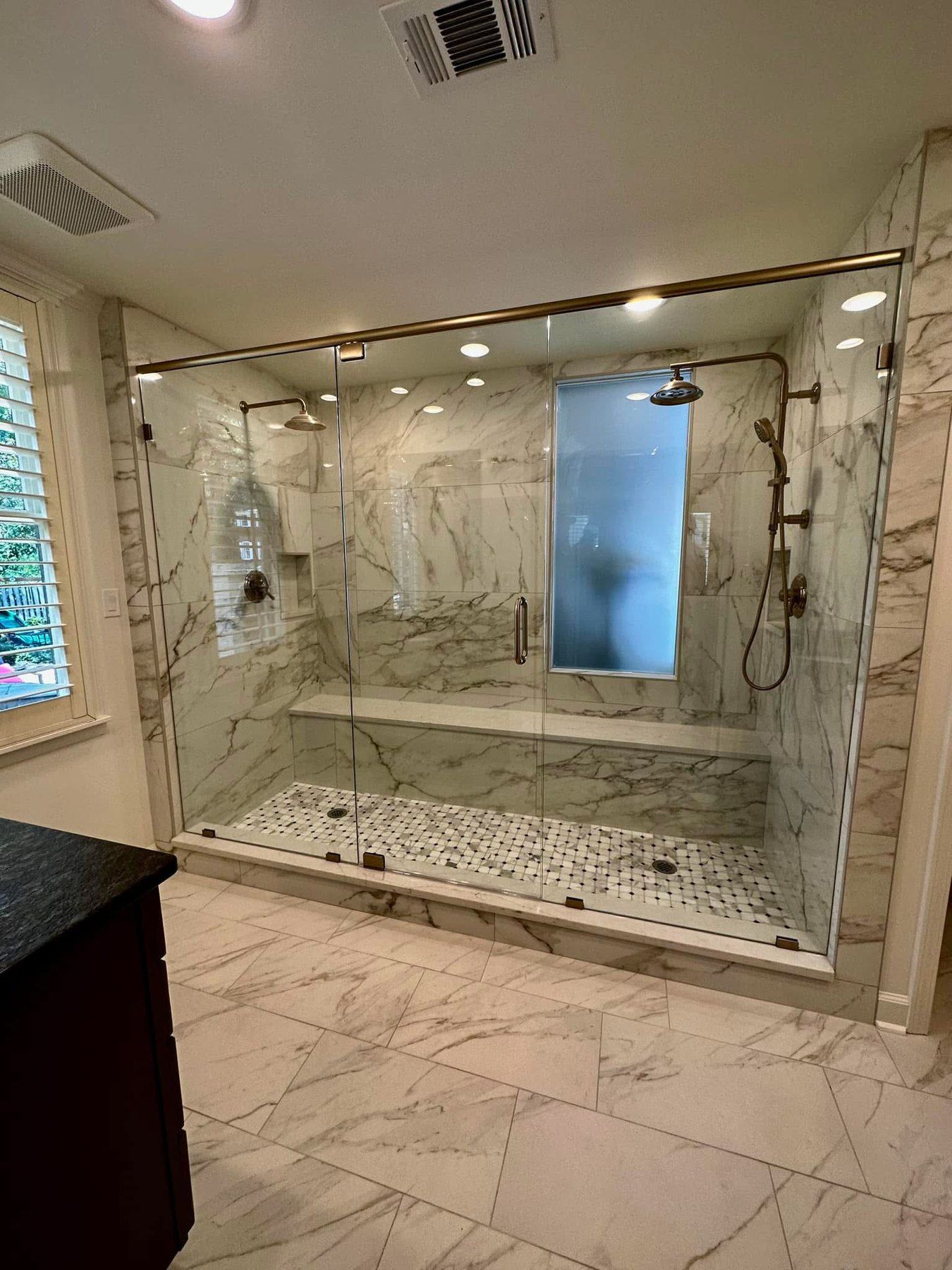 Custom tile shower completed by Crain Bros Inc as part of a Northeast Arkansas bathroom remodel