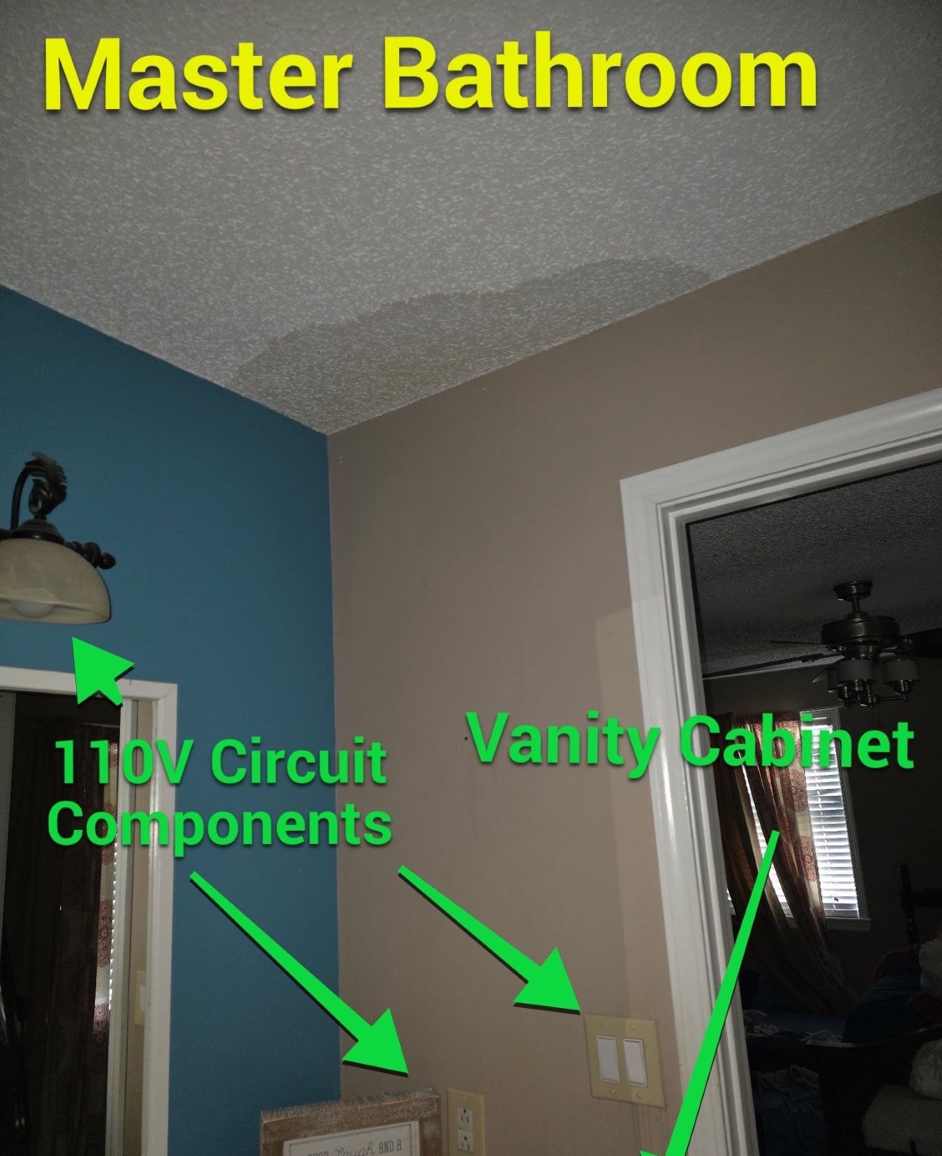 Water-damaged drywall at a wall and ceiling after a roof leak