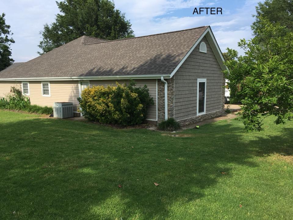 Same exterior gable wall and window area after fire damage restoration