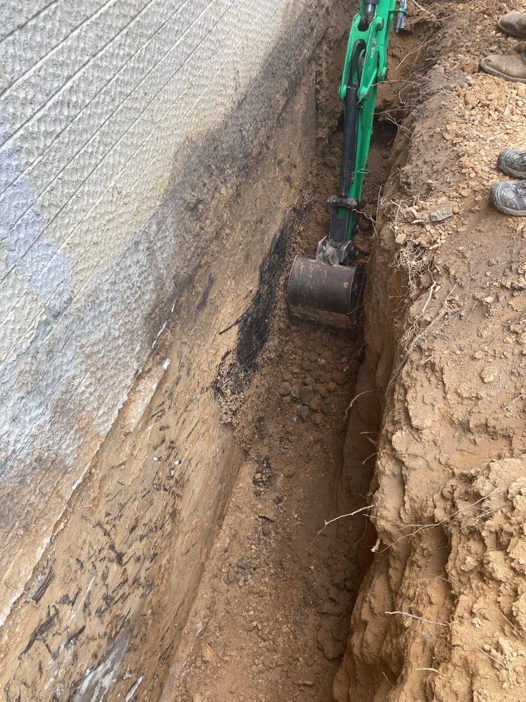Foundation excavation for repair and waterproofing preparation, photograph 2, in Northeast Arkansas