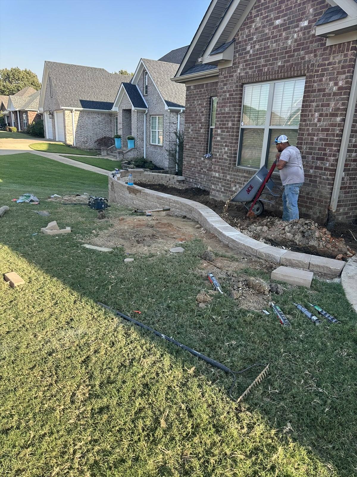 Retaining wall construction process at a Northeast Arkansas property, photograph 3