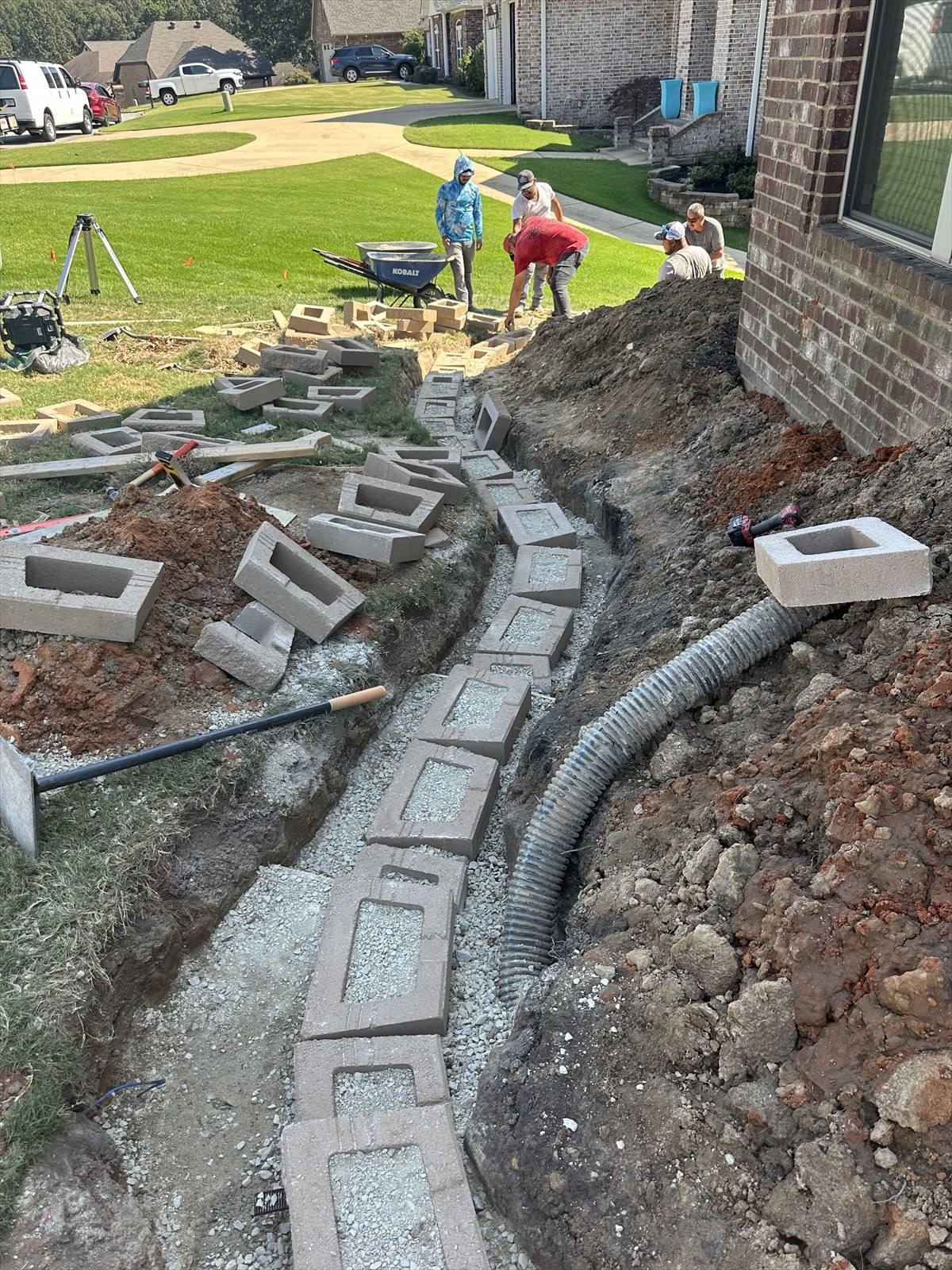 Retaining wall construction process at a Northeast Arkansas property, photograph 6