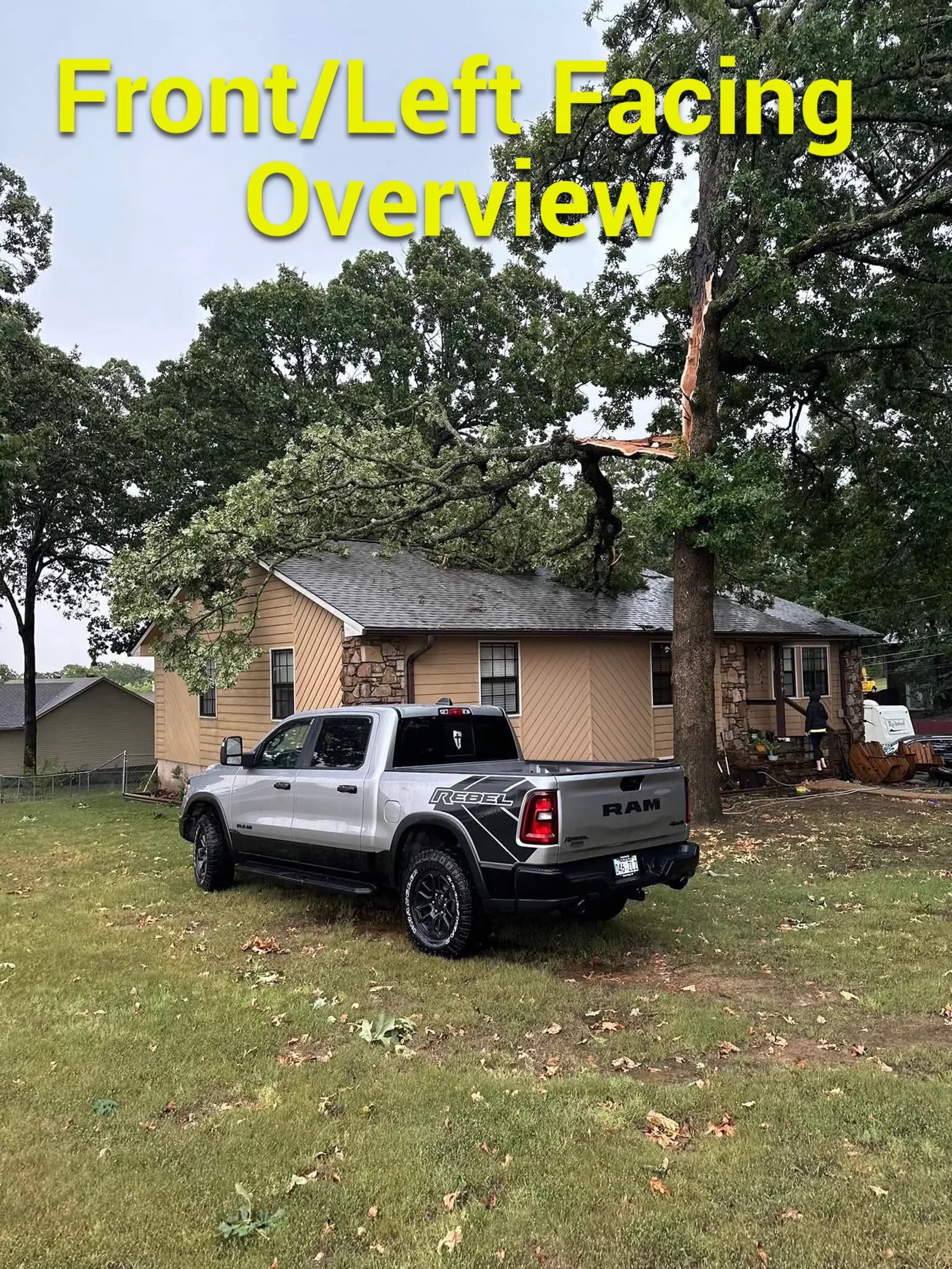 Overview of a live tree that fell onto a residential roof during a Northeast Arkansas storm.