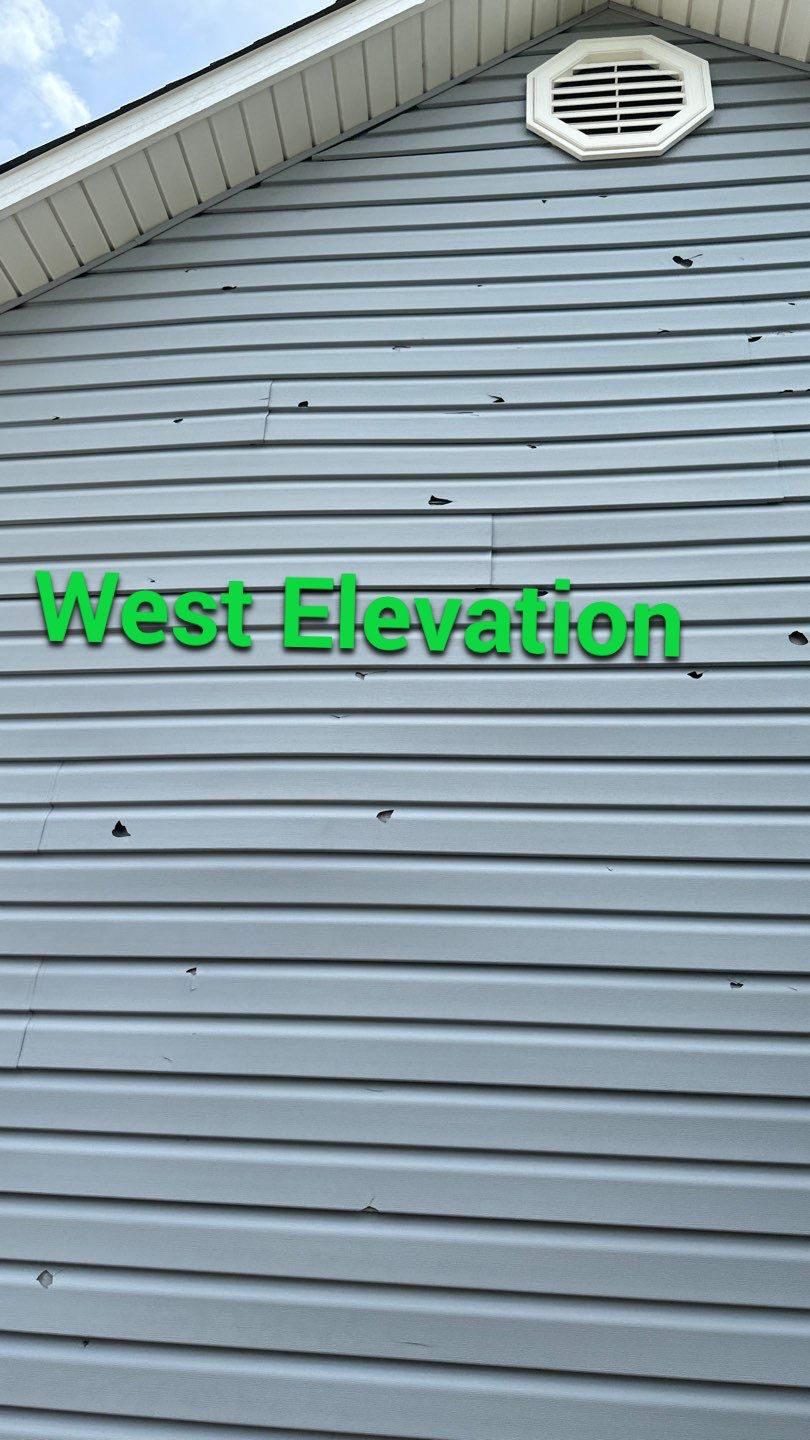 Hail damage affecting exterior materials on a Northeast Arkansas home