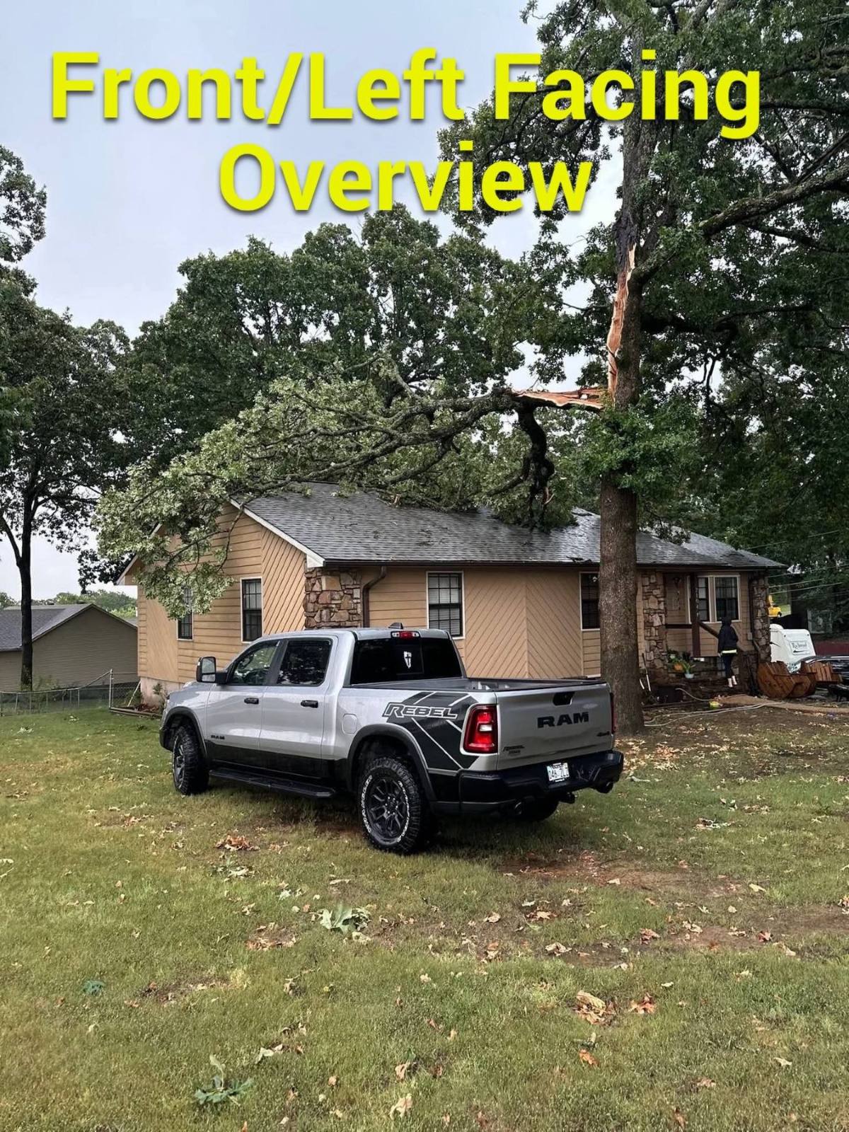 Tree impact damage affecting the roof of a Northeast Arkansas property after a storm