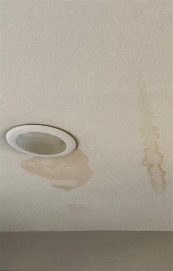 Ceiling damage caused by water intrusion