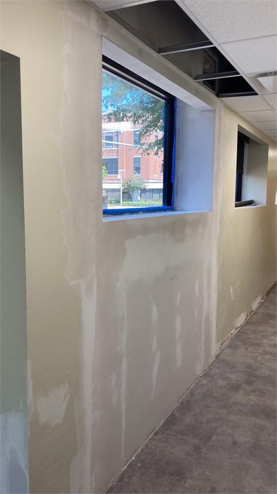 Drywall repair after window leak water damage