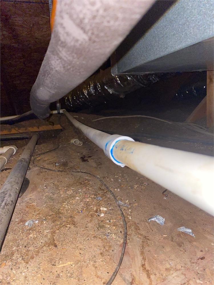 HVAC condensation drain pipe leak causing water damage