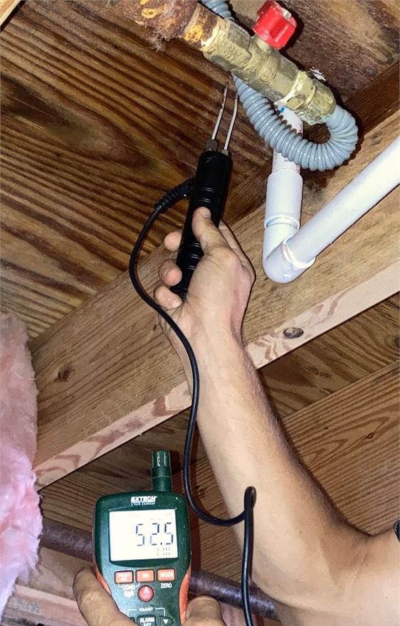 Plumbing leak inspection during water damage assessment